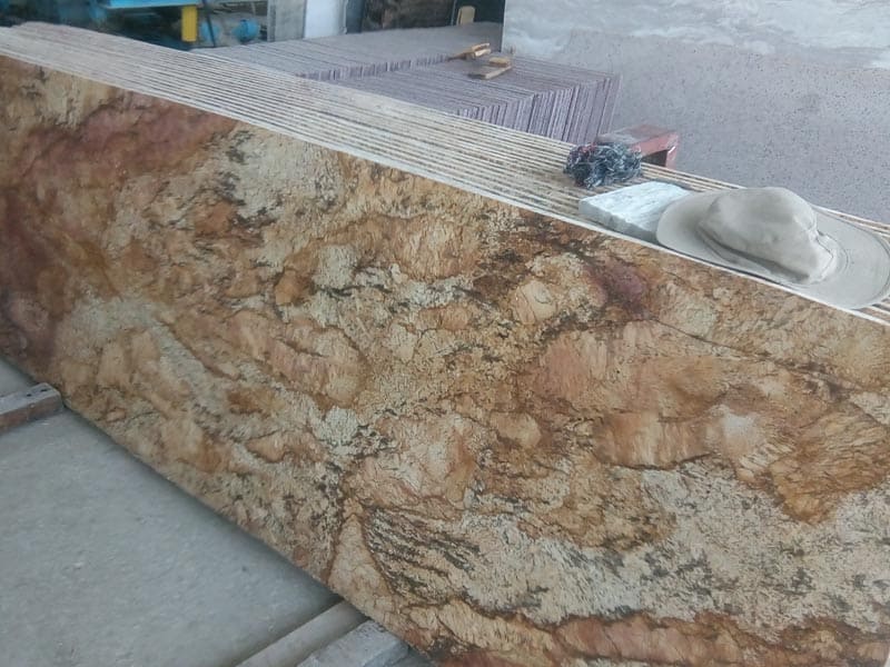alaska-gold-granite-cutter-size-polished-slabs